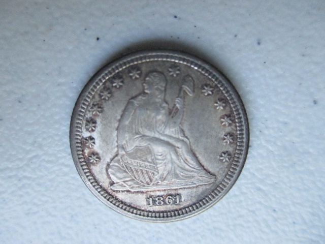 1861 Seated Liberty quarter from a large coin collection