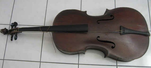 This cello had splits and cracks, yet still brought nearly $1,500 at auction.