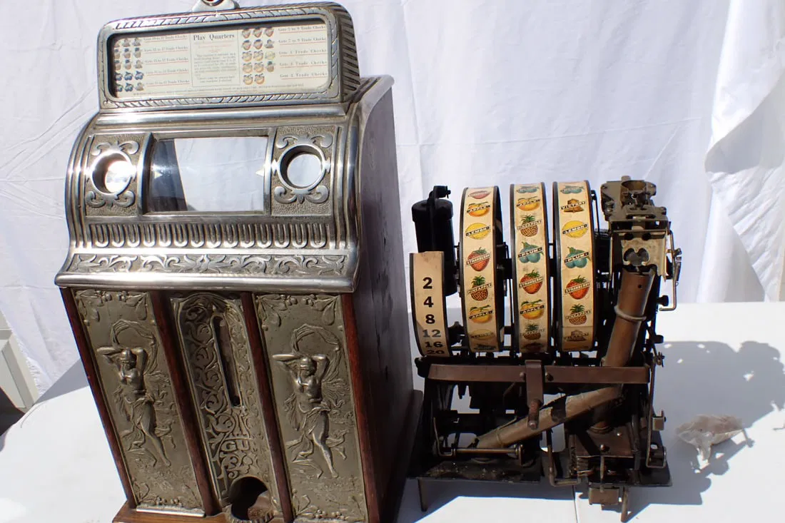 Caille Victory Bell Slot Machine, Quarter Machine - sold at auction for $4,000