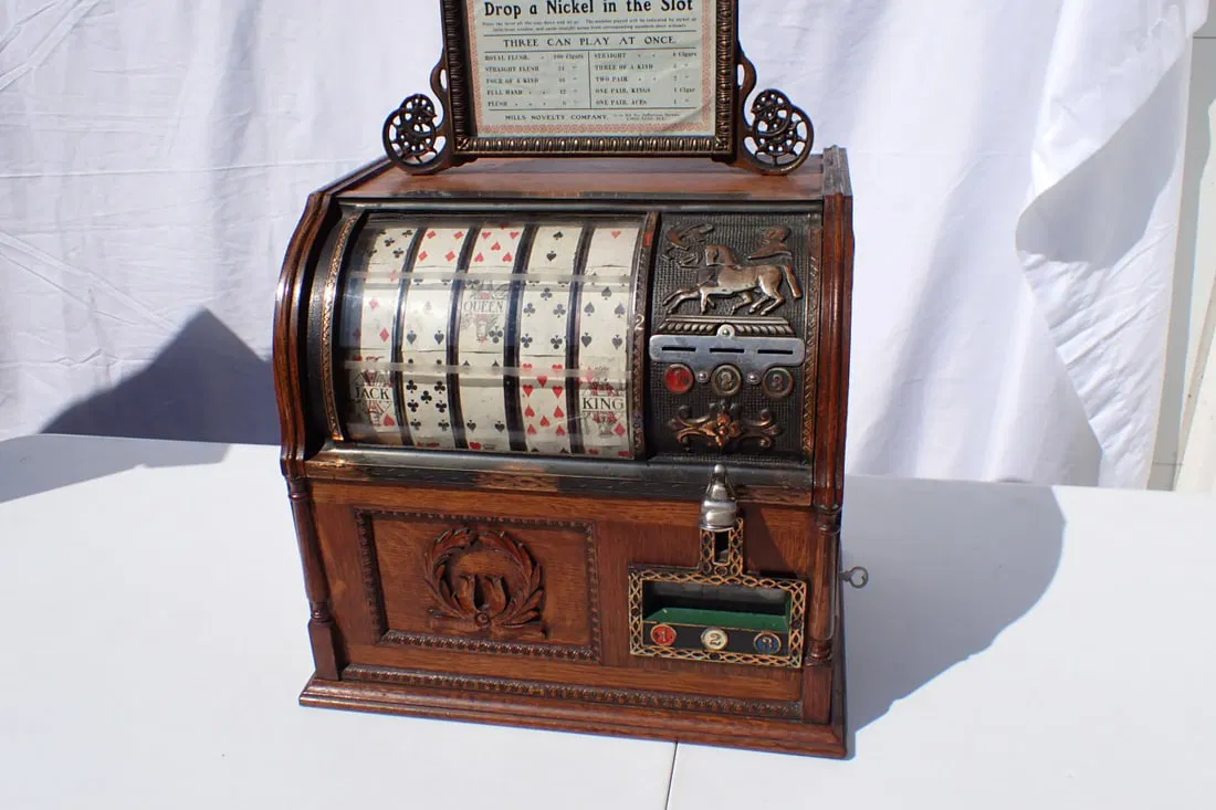 Mills Five Cent Jockey Poker Hand Trade Stimulator/Slot Machine - sold at auction for $4,200